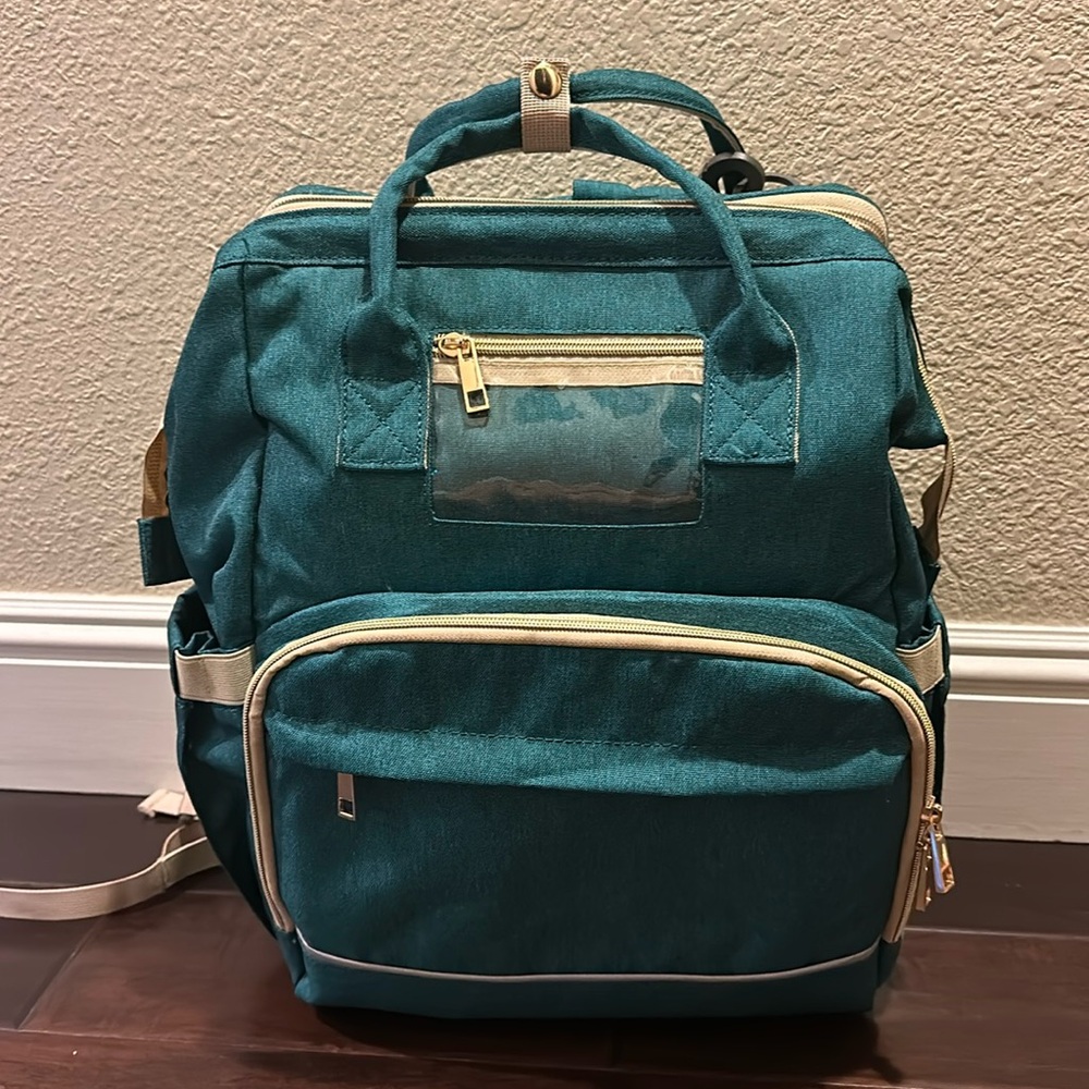 BRAND NEW Diaper bag with changing station